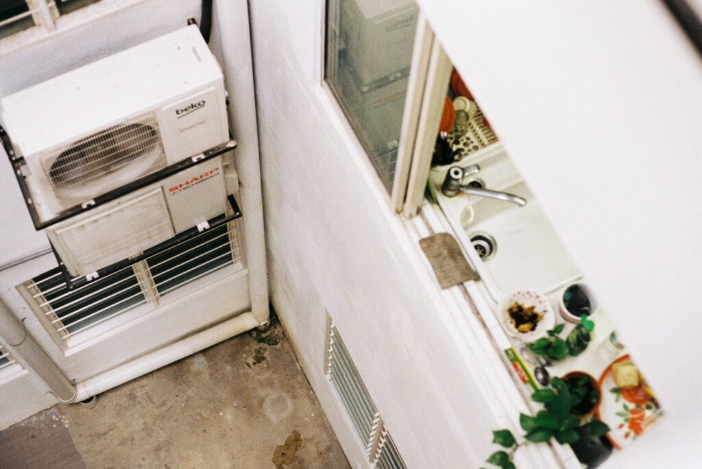 a white refrigerator freezer sitting inside of a kitchen