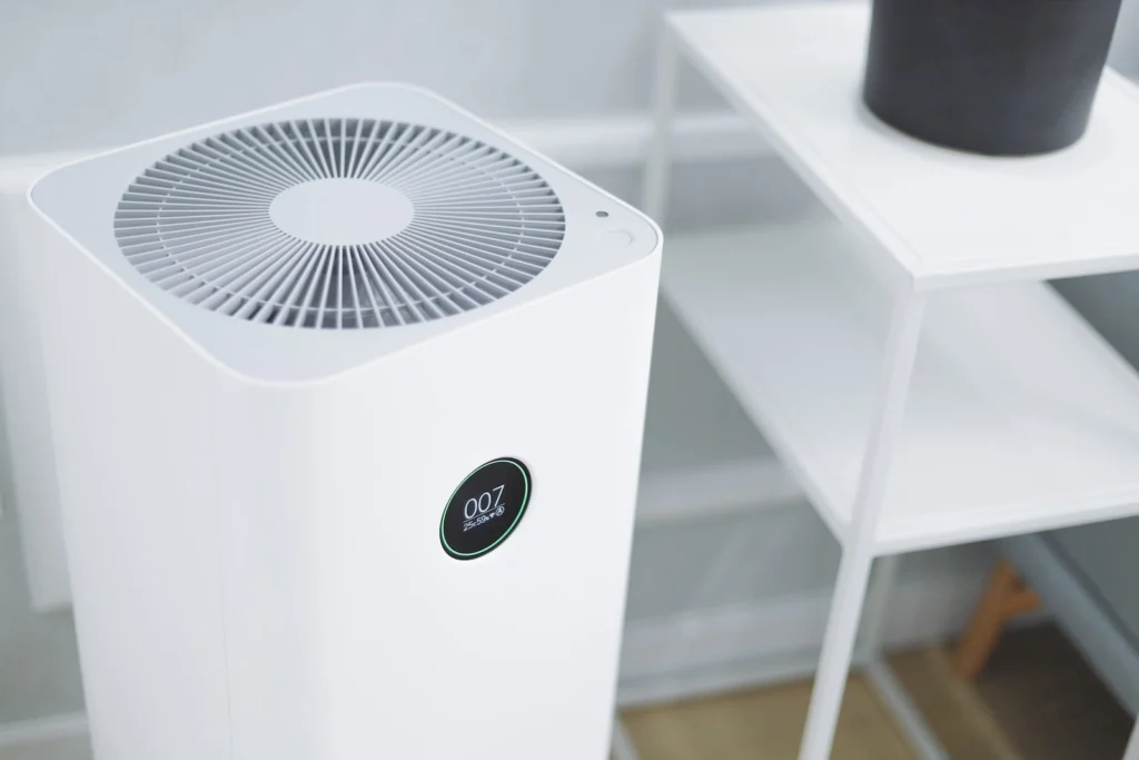 white and gray portable fan